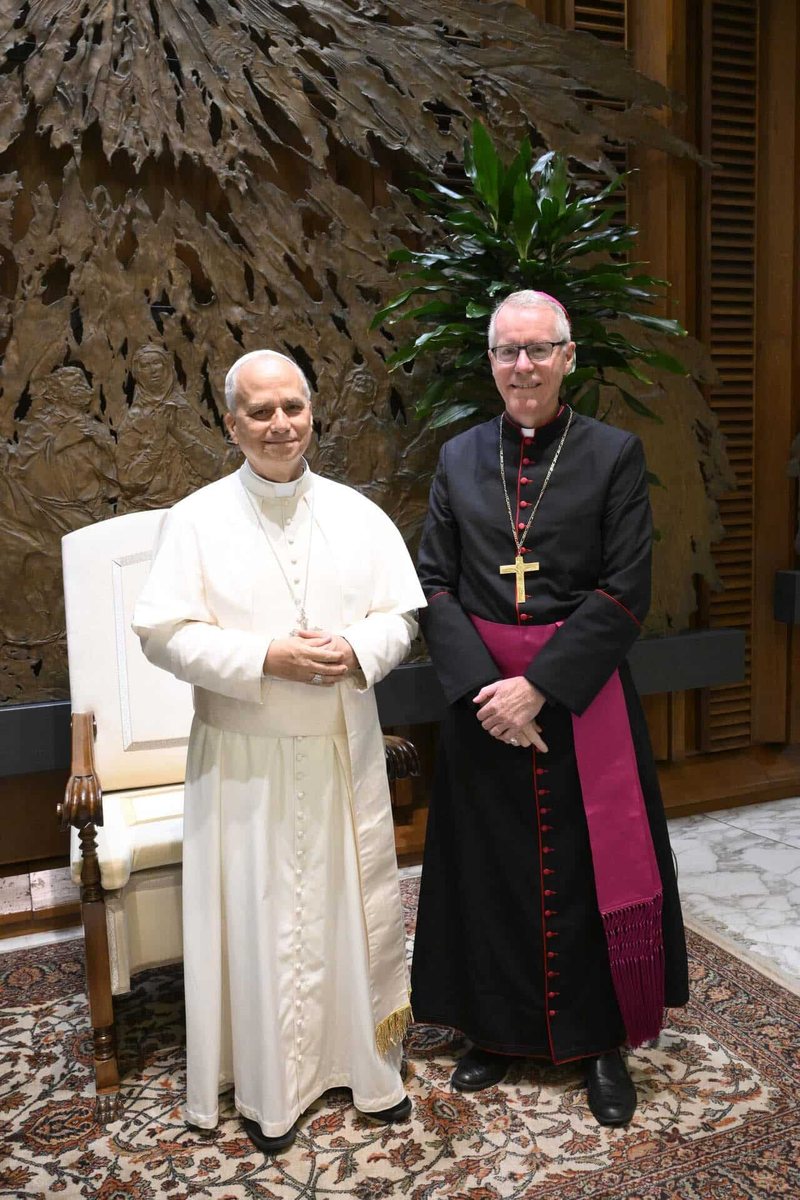 Pope Leo XIV standing with Bishop Anthony Percy at the Vatican